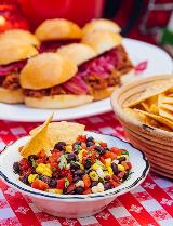 Image of black bean and corn salsa with Tuttorosso Tomatoes and chips